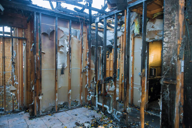 Professional Fire Damage Removal technician working in Chisholm, ME